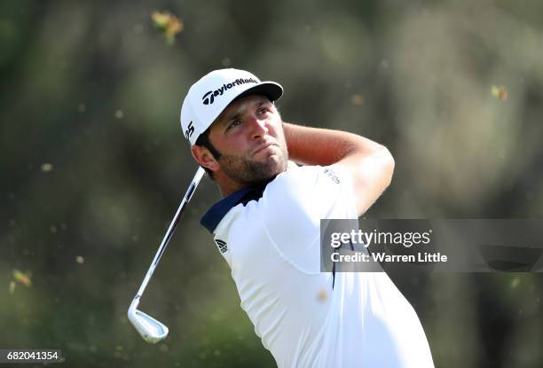 Jon Rahm of Spain plays his shot from the 12th tee during the first round of THE PLAYERS Championship at the Stadium course at TPC Sawgrass on May...