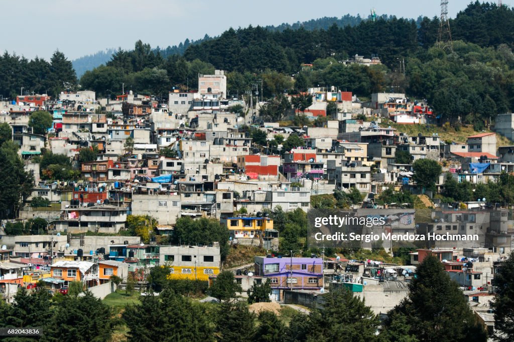 Colorful houses on a hill near Mexico City