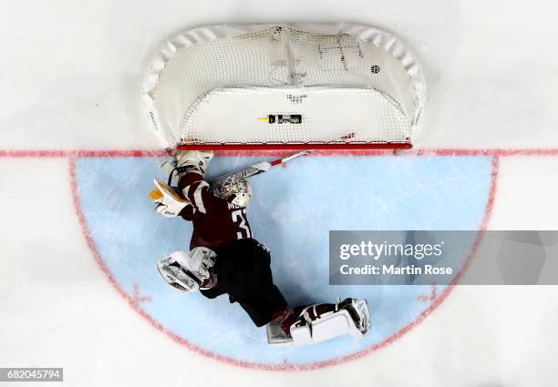 Elvis Merzlikins, goaltender of Latvia receives the 2nd goal during the 2017 IIHF Ice Hockey World Championship game between Sweden and Latvia at...