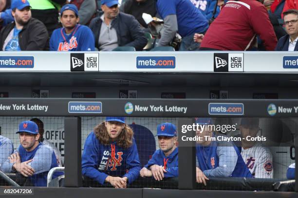 May 9: Matt Harvey of the New York Mets in the dugout with teammates Jacob deGrom, David Wright, Noah Syndergaard with Zack Wheeler waiting to pitch...