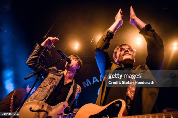 Singer Bjoern Dixgard and Guitarist Jens Siverstedt of Mando Diao perform live on stage during a concert at Saeaelchen on May 11, 2017 in Berlin,...
