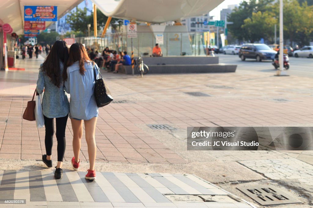 Two girls had street shooping at Kaohsiung City, Taiwan