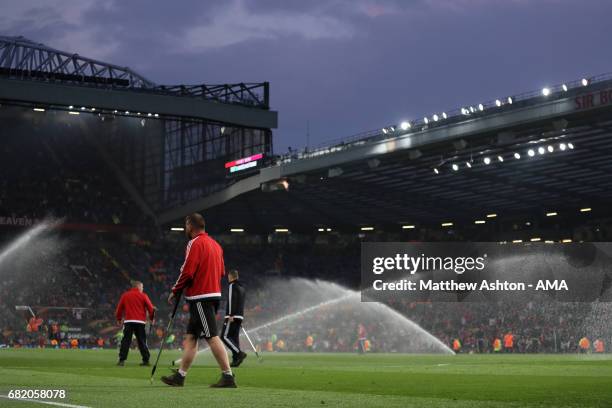 General View of ground staff and sprinklers during the UEFA Europa League, semi final second leg match, between Manchester United and Celta Vigo at...