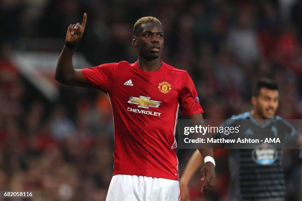 Paul Pogba of Manchester United reacts to a challenge during the UEFA Europa League, semi final second leg match, between Manchester United and Celta...