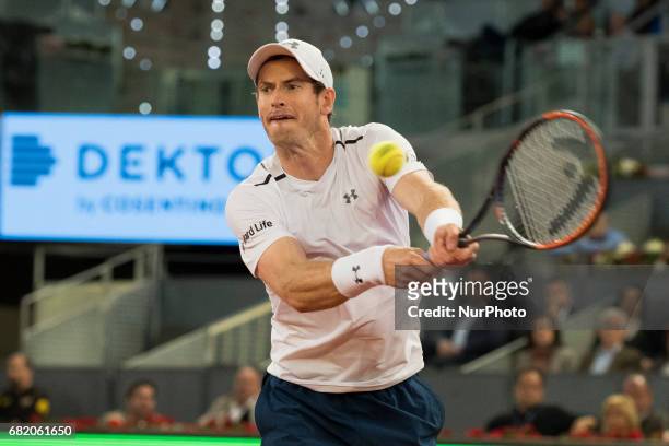 Andy Murray of United Kingdom against Borna Coric of Croatia during day six of the Mutua Madrid Open tennis at La Caja Magica on May 11, 2017 in...