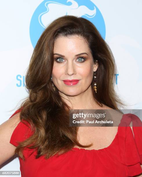 Actress / Playboy Playmate Carrie Stevens attends the Single Mom's Awards at The Peninsula Beverly Hills on May 11, 2017 in Beverly Hills, California.