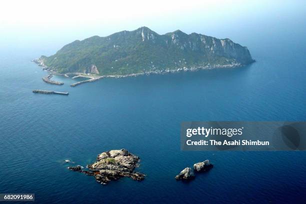 In this aerial image, Okinoshima Island is seen on May 6, 2017 in Munakata, Fukuoka, Japan. A remote island in southwestern Japan that is deemed so...