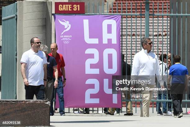 Evaluation Commission Chairman Patrick Baumann and LA 2024 Chairman Casey Wasserman tour the Los Angeles Memorial Coliseum May 11 in Los Angeles,...