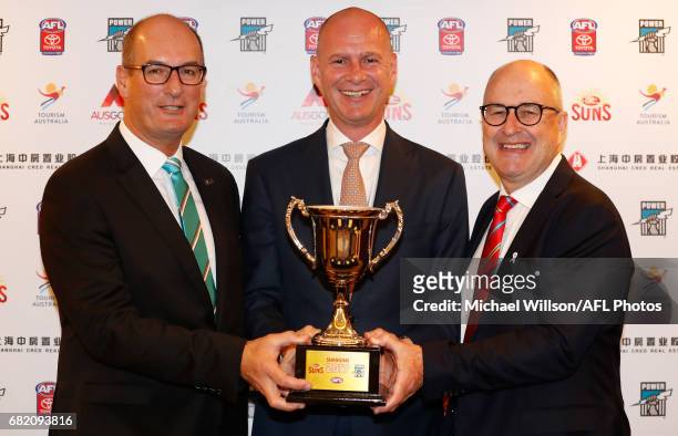 David Koch Chairman of the Power, Andrew Hogg Tourism Australia Regional General Manager Greater China and Tony Cochrane Chairman of the Suns pose...
