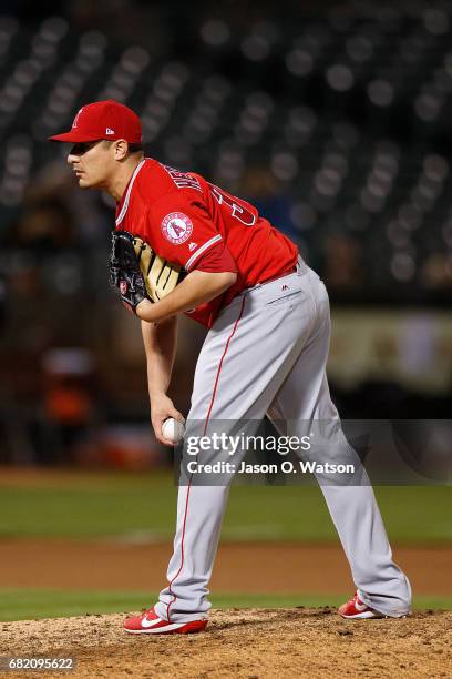 David Hernandez of the Los Angeles Angels of Anaheim stands on the pitchers mound during the eighth inning against the Oakland Athletics at the...