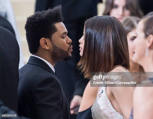 Singers The Weeknd and Selena Gomez are seen at the 'Rei Kawakubo/Comme des Garcons: Art Of The In-Between' Costume Institute Gala at Metropolitan...