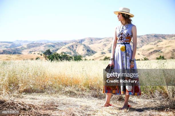 Model poses before the Christian Dior Cruise 2018 Runway Show at the Upper Las Virgenes Canyon Open Space Preserve on May 11, 2017 in Santa Monica,...