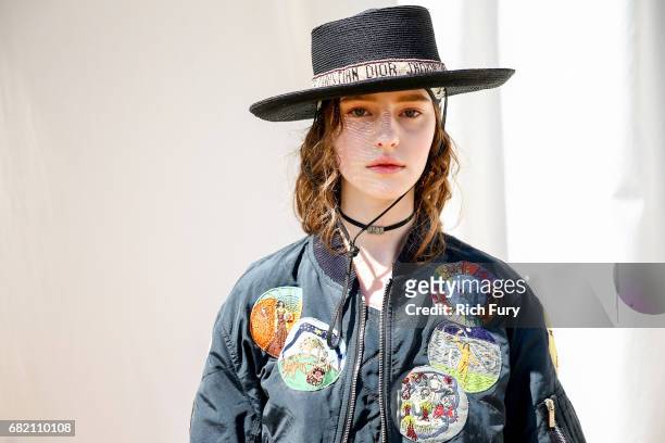 Model poses before the Christian Dior Cruise 2018 Runway Show at the Upper Las Virgenes Canyon Open Space Preserve on May 11, 2017 in Santa Monica,...