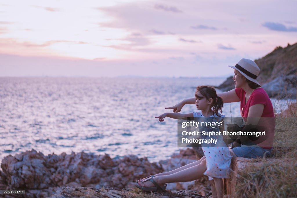 Mother & daughter killing time waiting for the sunset