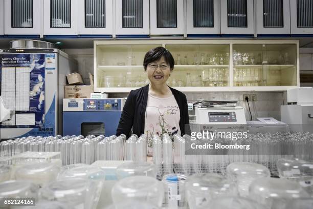 Li Jianyue, professor of life and environment sciences at Shanghai Normal University, poses for a photograph inside a laboratory at Shanghai Normal...