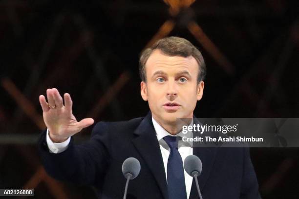 Leader of 'En Marche !' Emmanuel Macron speaks to supporters after winning the French Presidential Election, at The Louvre on May 7, 2017 in Paris,...