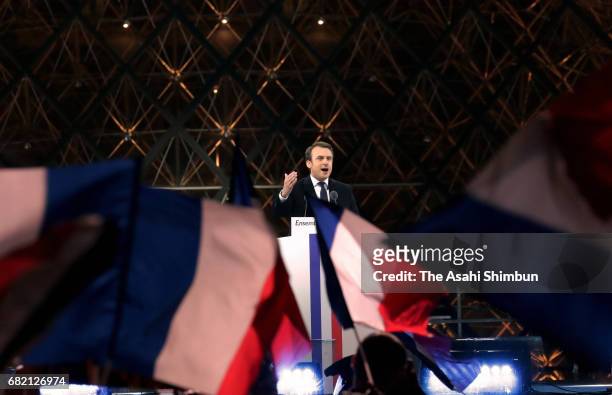 Leader of 'En Marche !' Emmanuel Macron speaks to supporters after winning the French Presidential Election, at The Louvre on May 7, 2017 in Paris,...