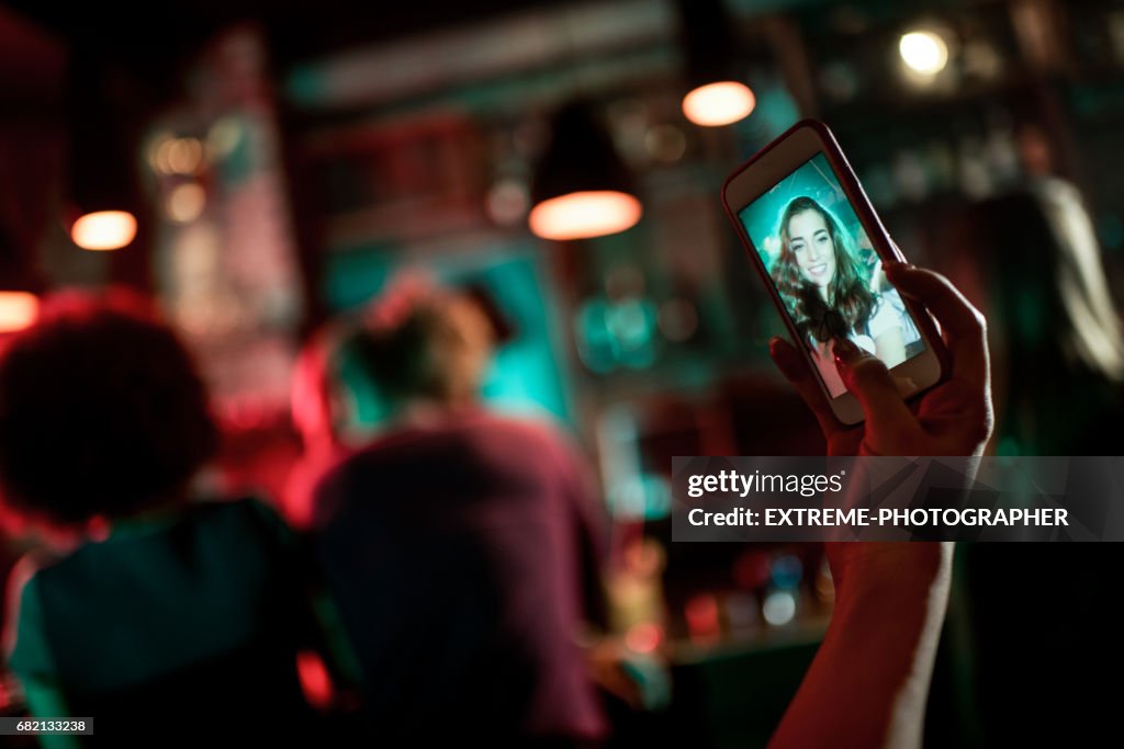 Taking a selfie in the pub