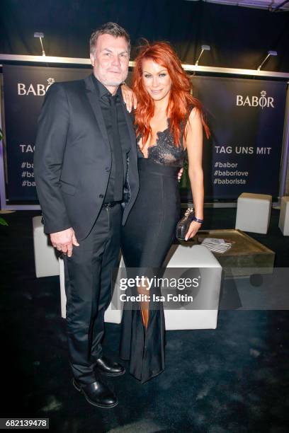 Former German soccer player Thomas Helmer and his wife German actress Yasmina Filali attend the Duftstars at Kraftwerk Mitte on May 11, 2017 in...