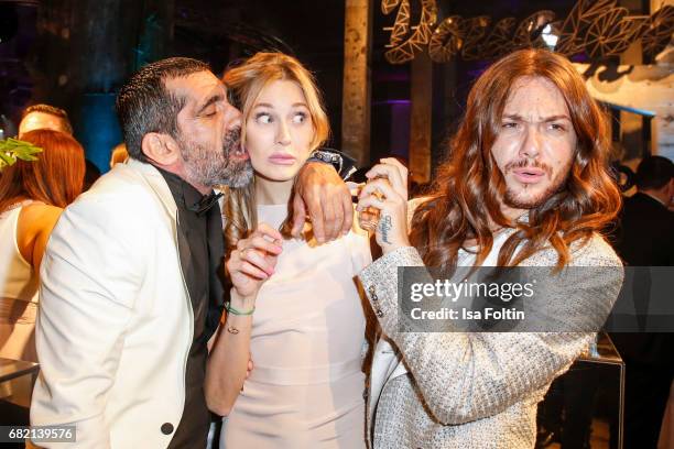 German actor Erdal Yildiz, Model Mandy Bork and Influencer Riccardo Simonetti attend the Duftstars at Kraftwerk Mitte on May 11, 2017 in Berlin,...