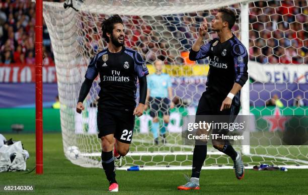 Isco of Real Madrid celebrates after scoring his team`s first goal with Cristiano Ronaldo of Real Madrid during the UEFA Champions League Semi Final...