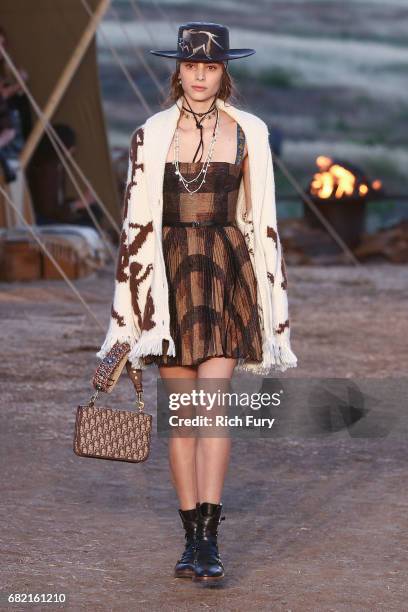 Model walks the runway during the Christian Dior Cruise 2018 Runway Show at the Upper Las Virgenes Canyon Open Space Preserve on May 11, 2017 in...