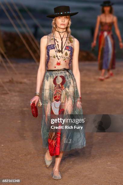 Model walks the runway during the Christian Dior Cruise 2018 Runway Show at the Upper Las Virgenes Canyon Open Space Preserve on May 11, 2017 in...