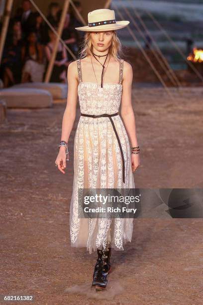 Model walks the runway during the Christian Dior Cruise 2018 Runway Show at the Upper Las Virgenes Canyon Open Space Preserve on May 11, 2017 in...