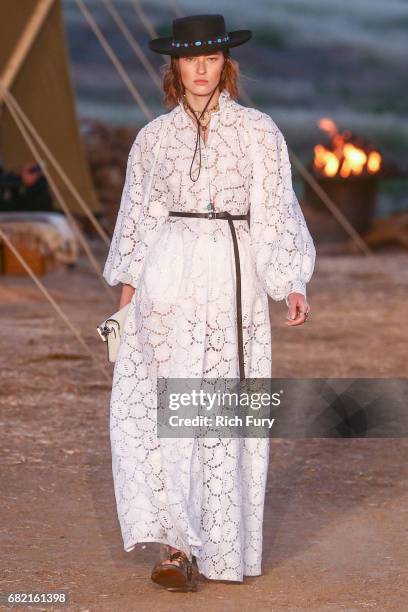 Model walks the runway during the Christian Dior Cruise 2018 Runway Show at the Upper Las Virgenes Canyon Open Space Preserve on May 11, 2017 in...