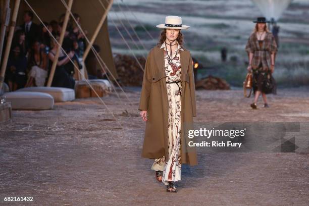 Model walks the runway during the Christian Dior Cruise 2018 Runway Show at the Upper Las Virgenes Canyon Open Space Preserve on May 11, 2017 in...