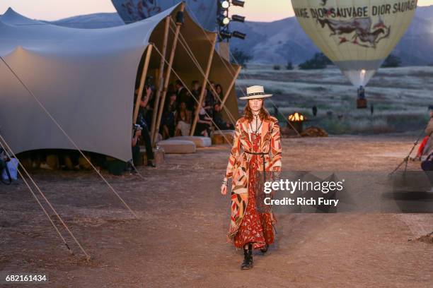 Model walks the runway during the Christian Dior Cruise 2018 Runway Show at the Upper Las Virgenes Canyon Open Space Preserve on May 11, 2017 in...