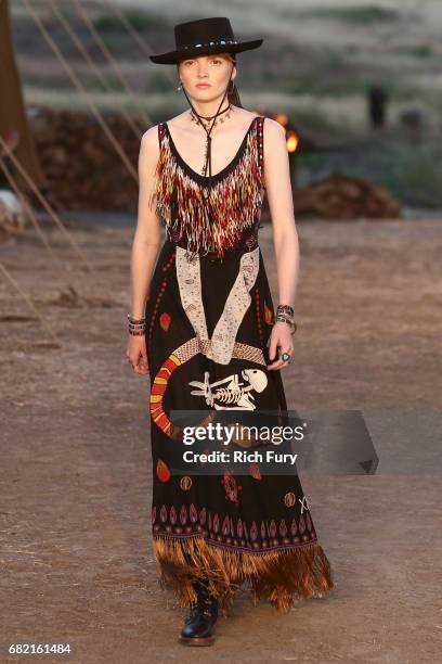 Model walks the runway during the Christian Dior Cruise 2018 Runway Show at the Upper Las Virgenes Canyon Open Space Preserve on May 11, 2017 in...