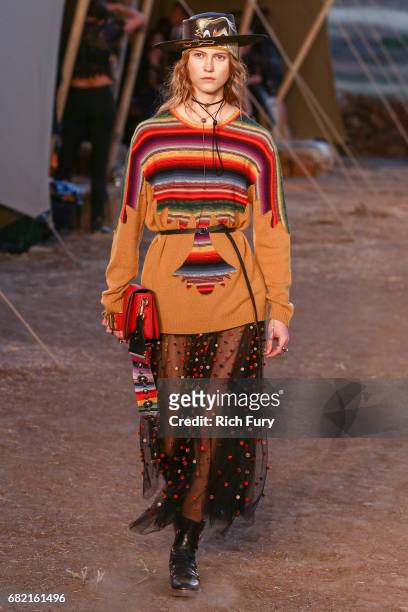 Model walks the runway during the Christian Dior Cruise 2018 Runway Show at the Upper Las Virgenes Canyon Open Space Preserve on May 11, 2017 in...