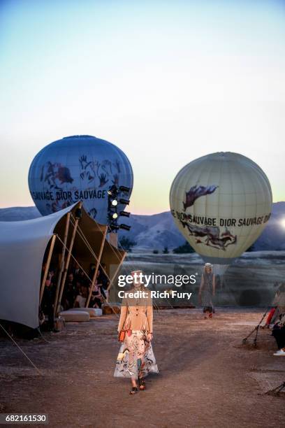 Model walks the runway during the Christian Dior Cruise 2018 Runway Show at the Upper Las Virgenes Canyon Open Space Preserve on May 11, 2017 in...