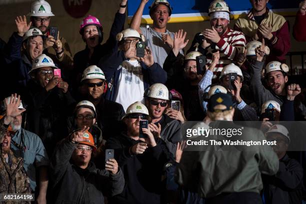 President Donald Trump greets Navy and shipyard personnel after speaking aboard nuclear aircraft carrier Gerald R. Ford at Newport News Shipbuilding...
