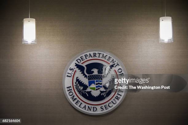 Department of Homeland Security logo is seen inside press conference room on Thursday, May 11 at the U.S. Immigration and Customs Enforcement...