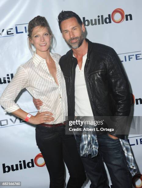 Actress Alexia Barlier and Ed Leyken attend the BuildOn Benefit Concert held at The Roxy Theatre on May 11, 2017 in Westwood, California.