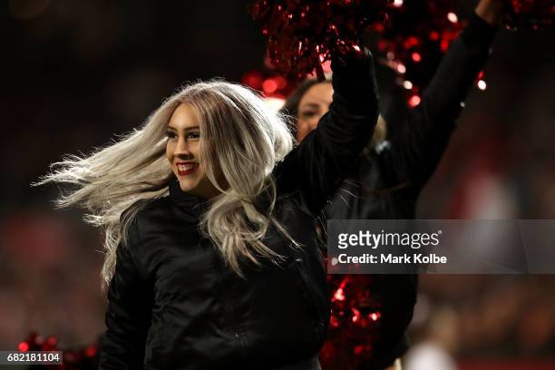 The Flames cheergirls perform during the round 10 NRL match between the St George Illawarra Dragons and the Cronulla Sharks at UOW Jubilee Oval on...