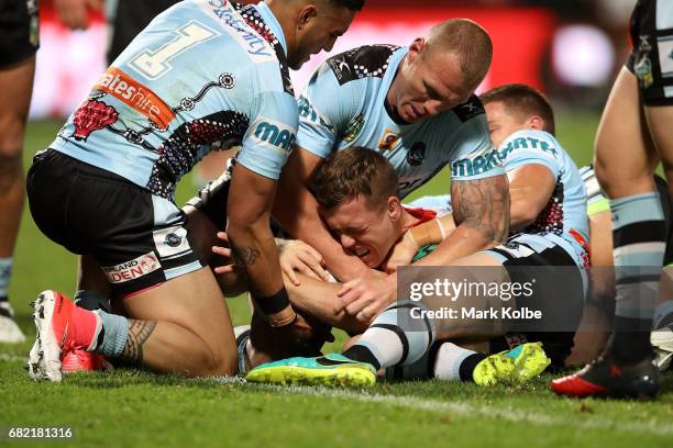 Cameron McInnes of the Dragons is tackled short of the try line during the round 10 NRL match between the St George Illawarra Dragons and the...