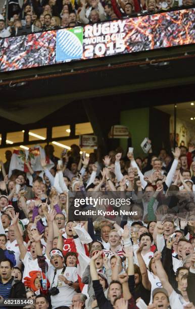 Photo taken in September 2015 shows the crowd at the opening ceremony of the Rugby World Cup at Twickenham Stadium in London. England rugby coach...