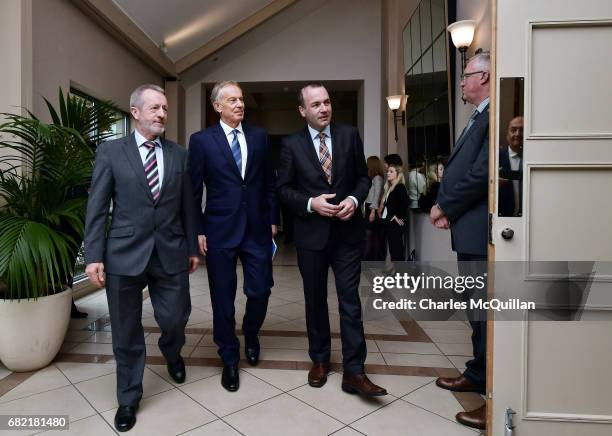 Former British Prime Minister Tony Blair and EPP Group Chairman Manfred Weber arrive for the European People's Party Group Bureau meeting at Druids...