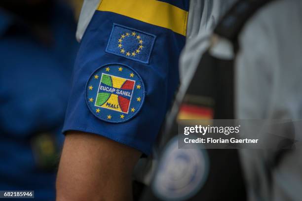 April 07: Emblem of EUCAP SAHEL on the arm of a security force on April 07, 2017 in Bamako, Mali.
