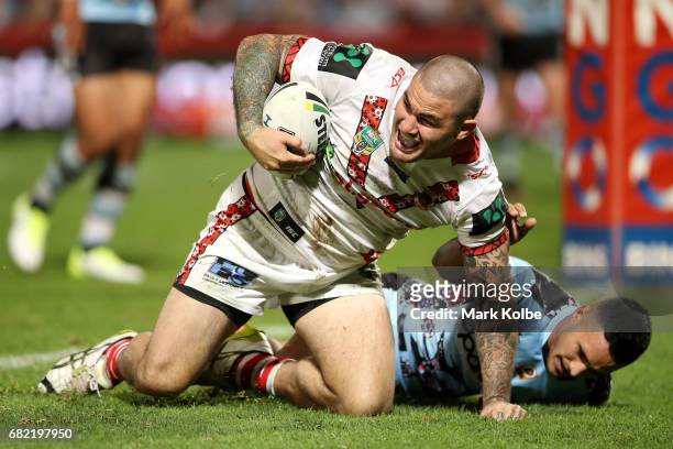 Russell Packer of the Dragons celebrates scoring a try during the round 10 NRL match between the St George Illawarra Dragons and the Cronulla Sharks...