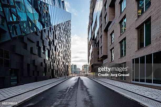 city street at dawn - norway road stock pictures, royalty-free photos & images