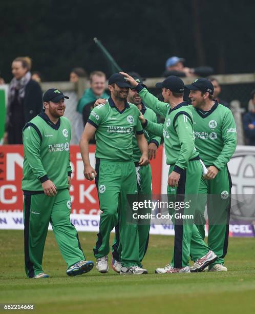 Dublin , Ireland - 12 May 2017; Tim Murtagh of Ireland, second from left, is congratulated by team-mates after catching out Sabbir Rahman of...