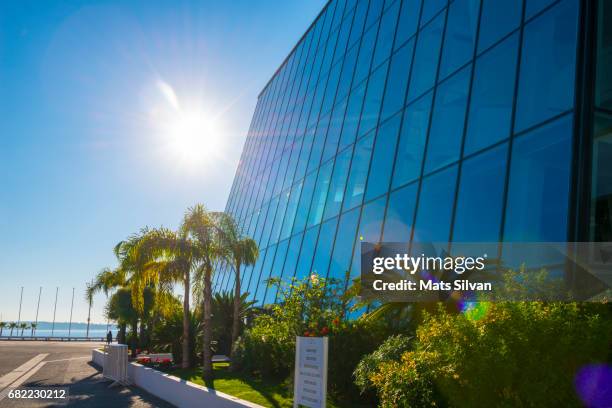 facade of the palais des festivals cannes with sunshine - cannes building stock pictures, royalty-free photos & images