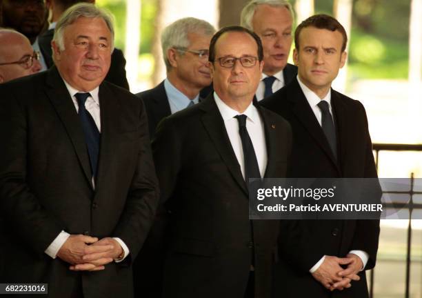 Outgoing French President François Hollande and newly elected French president Emmanuel Macron attend a ceremony at the Luxembourg Gardens to mark...