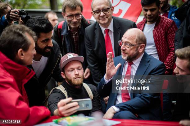 Martin Schulz, leader of the German Social Democrats speaks with his supporters during his SPD campaign prior state elections in North...