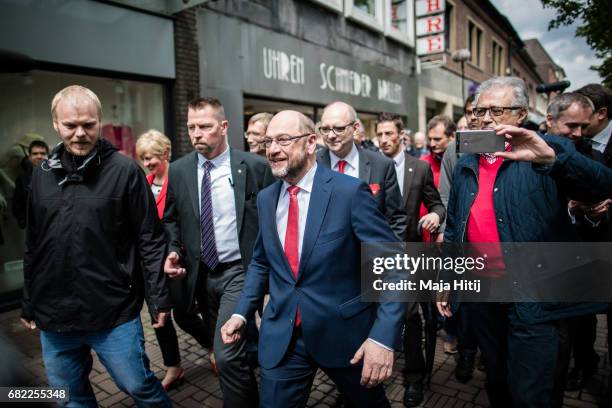 Martin Schulz, leader of the German Social Democrats walks during his SPD campaign prior state elections in North Rhine-Westphalia on May 12, 2017 in...