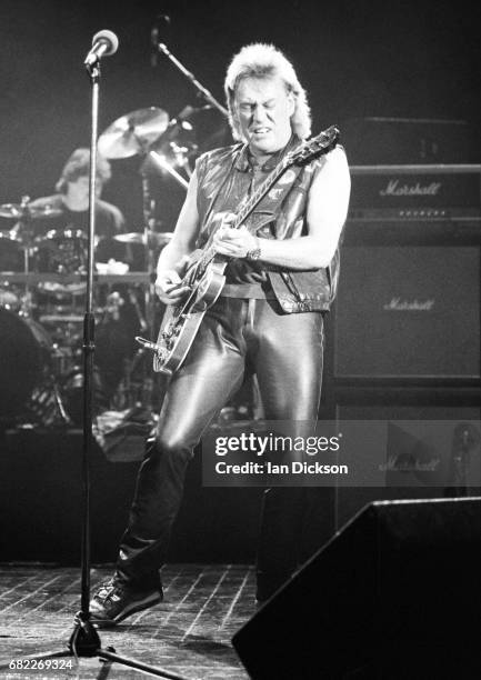 Alvin Lee of Ten Years After performing on stage at Hammersmith Odeon, London, 27 January 1990.